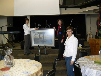 Rebecca, Anne and Irma setting up