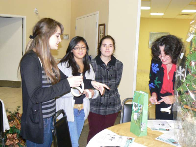 Anne instructs student volunteers