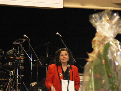 Anne Acacia addresses the guests