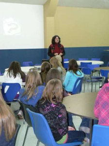 Anne Acacia addresses a very interested audience